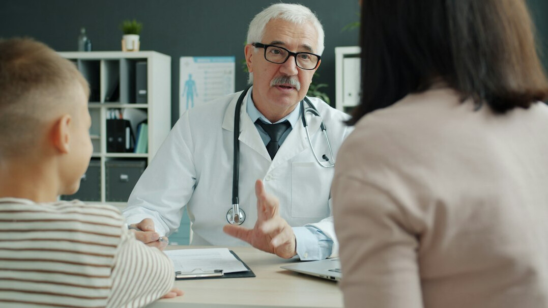 doctor discussing with patient